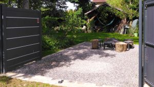 Place de stationnement graviers stabilisé + bordure en pavés 1